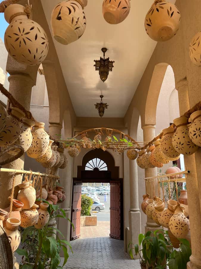 AMOUAGE: Full Day Private Trip to Nizwa and Al Jabal Akhdar - Birkat Al Mouz, mud brick houses and falaj irrigation you can still see