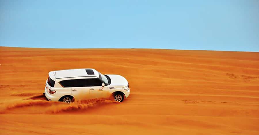 Desert Safari - Private 4WD car - The dune bashing segment, sandboarding, and that sunset photo stop
