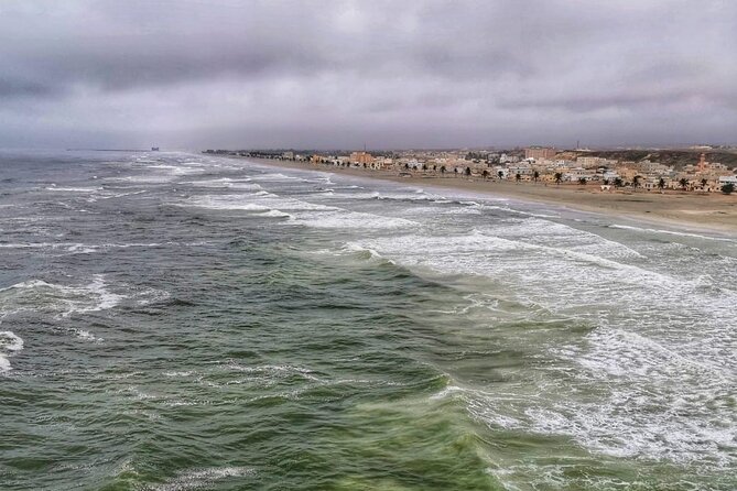East of Salalah, Mountain Safari, Camels, Waterfall, White beach - Taqah start: old town energy before the mountains
