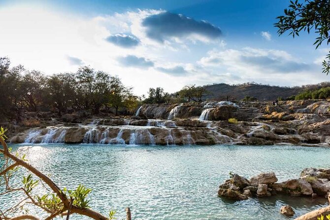 East & West Salalah Combination Tour - Darbat Waterfall, Mughsail - Taqah Beach first, then Taqah Castle: birds, views, and Taqa stone