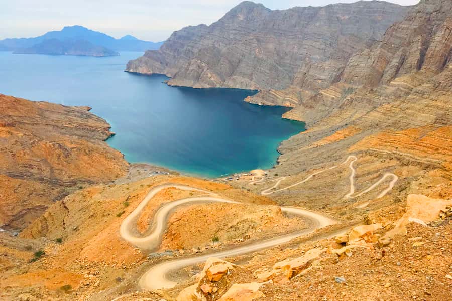 From Khasab: Half-Day Mountain Safari to Jabel Harim - Fossil wall and fossil-studded rocks: the science stop you’ll actually enjoy