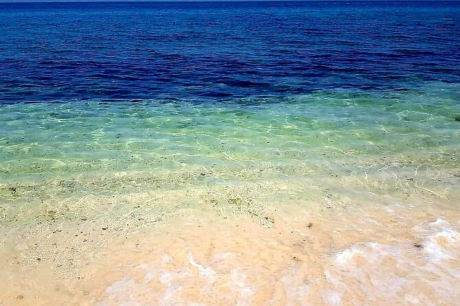 Full Day Group Tour to Wadi Shab Bimmah Sinkhole and Fins Beach - Key Highlights at a Glance