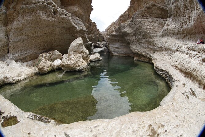 Full-day Private Guided Wadi Shab Tour in Oman - Bimmah Sinkhole (Hawiyyat Najm): the second swim with mountain views