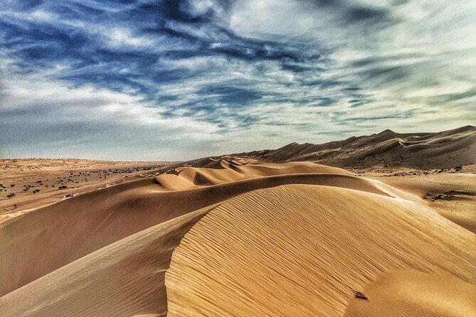 Full-Day Wahiba Desert and Wadi Bani Khalid Group Tour - Wahiba Sands: 4WD dune driving, desert fun, and Bedouin life