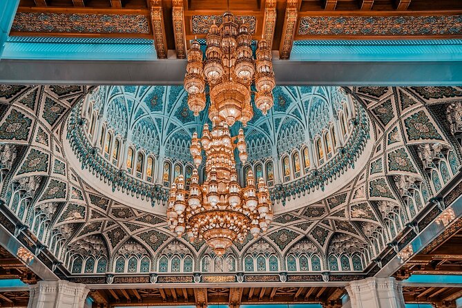Half-Day Private Muscat City Tour 4 Hours - Al Alam Palace: blue and gold exterior views with a sea-facing setting