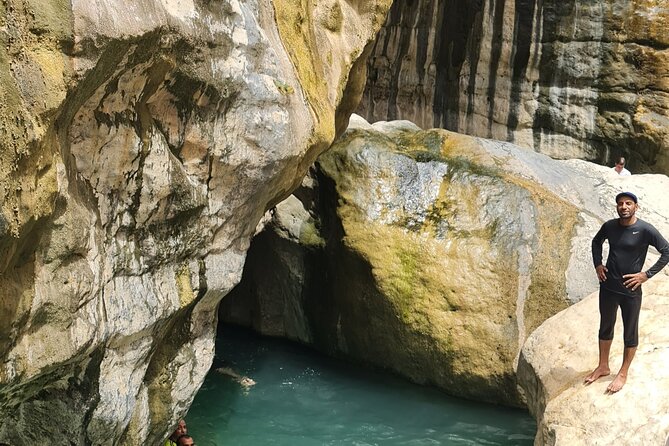 Hidden Gems of Oman: Sinkhole, Fins Beach & Wadi Tiwi Adventure - Fins Beach: White, Pebbly, and Time to Cool Off