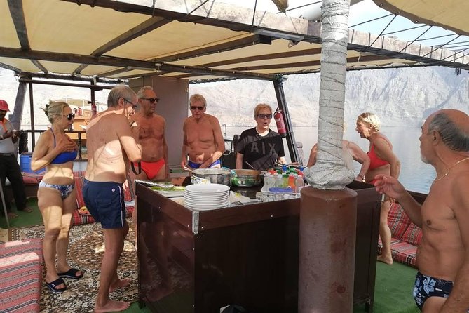 Khasab Dhow Cruise Full day, Buffet Lunch on Board, swimming - Two swim and snorkel stops where the day becomes memorable