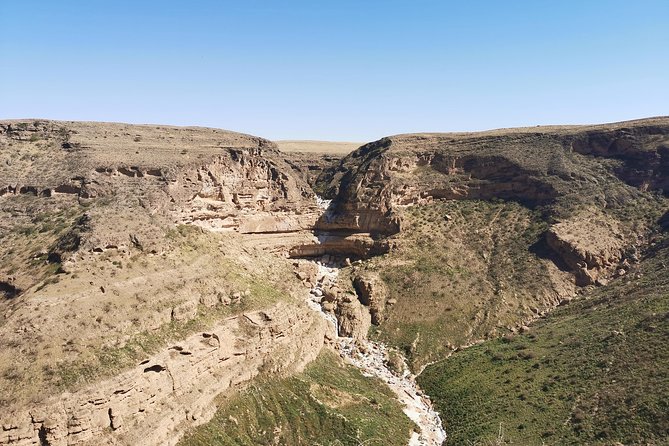 Mountain Tour - Darbat falls, Jebel Samhan, sinkholes, baobabs - Jabal Samhan viewpoint at 1340m: plains, sea views, and dragon trees