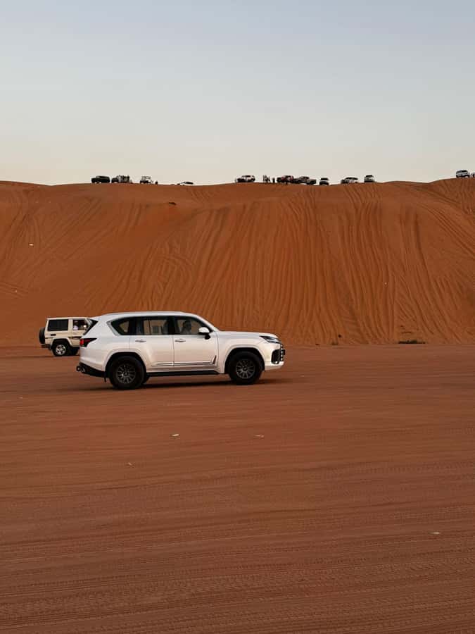 Muscat: Bidiya Desert Sunset Camel Ride with Transfer - Sunset viewing: clear air, big light, real atmosphere