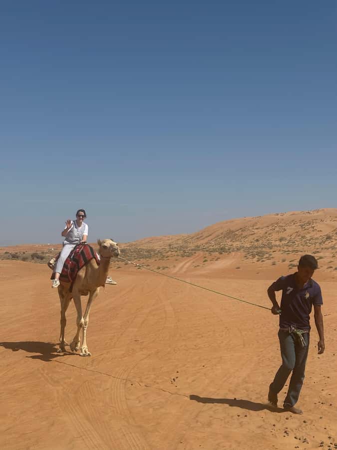 Muscat: Bidiya Desert Sunset Camel Ride with Transfer - Transfers from Muscat: easier logistics, less worry