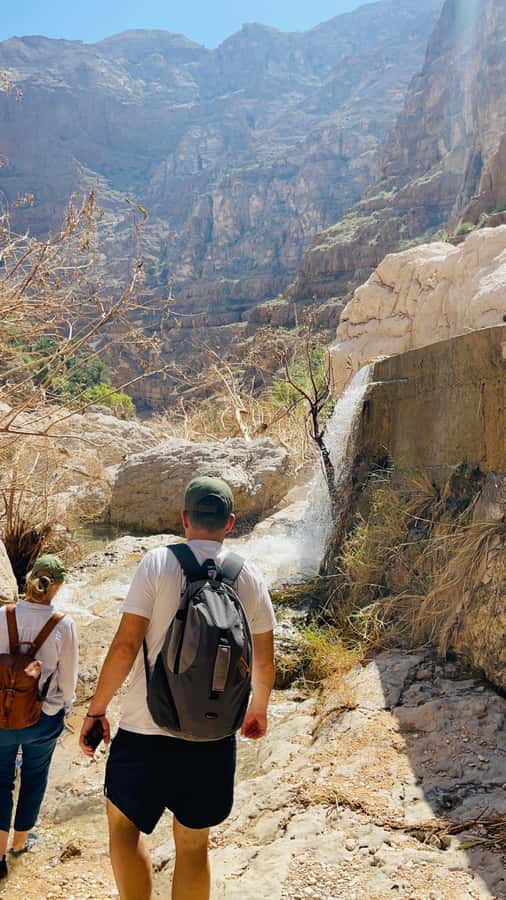 Muscat: Wadi Shab, Romantic Cave and Sinkhole Full-day Trip - The short boat crossing and the 40-minute canyon walk