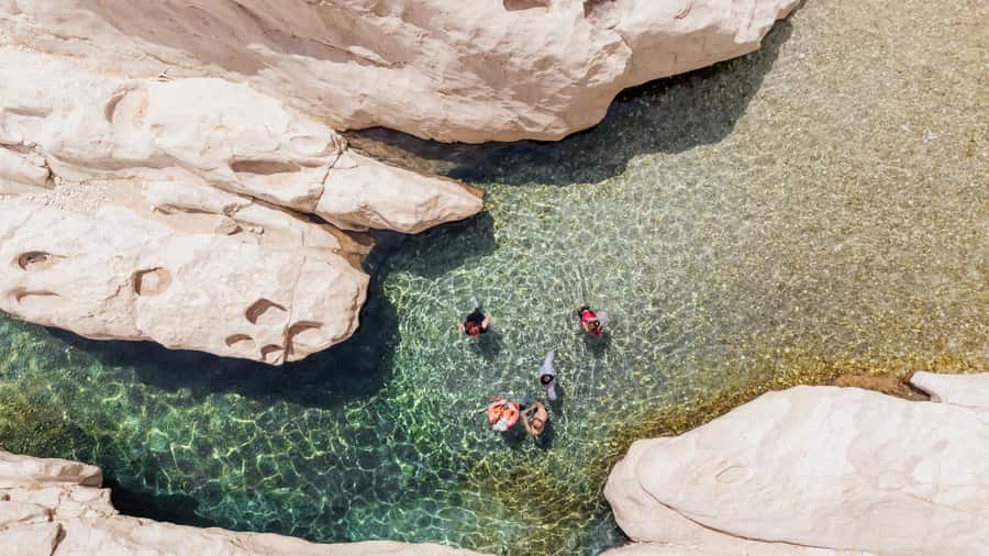Muscat: Wahiba Desert and Wadi Bani Khalid Guided Group Tour - Choosing the sunset option: more desert time, better light, calmer mood