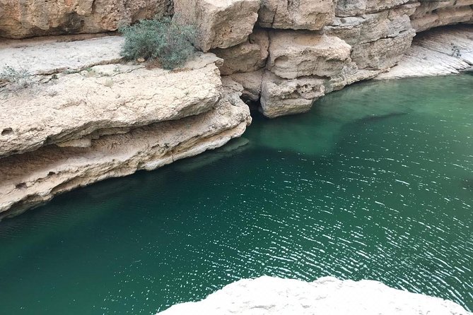 Private Day Trip to Wadi Shab, Fins Beach & Bimmah Sinkhole - Bimmah Sinkhole: A Turquoise Limestone Lake Close to the Sea