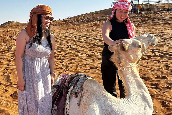 Private Desert Tour with Activities - Full Day - The dune drive toward sunset, with controlled thrills