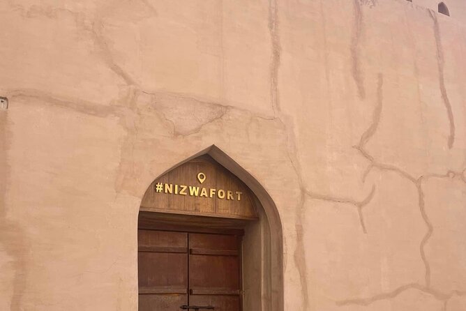 Private Explore Oman Grand Canyon, Jebel Shams and Nizwa - Walking the Nizwa Souq by the fort walls