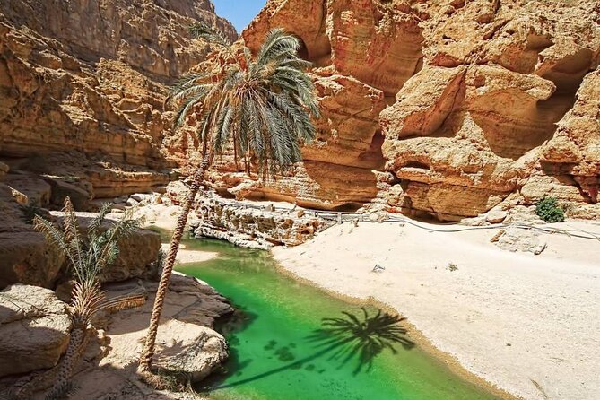 Private Full-Day Wadi Shab and Bimmah Sinkhole Tour - Entering Wadi Shab canyon, pools, and the keyhole cave
