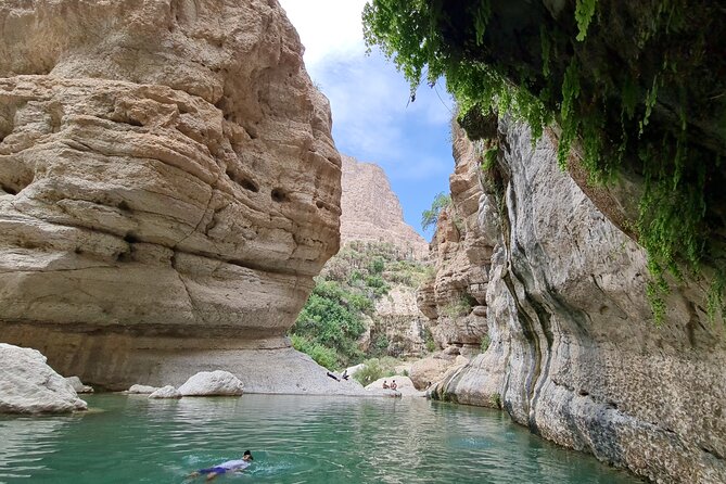 Private Full-Day Wadi Tiwi and Bimmah Sinkhole Tour from Muscat - Fins Beach (and White Sands): White Pebbles, Bright Blue Water