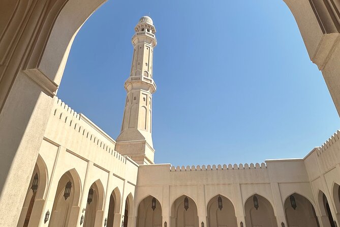 Salalah City tour - Stop 1: Sultan Qaboos Mosque, modern architecture in a calm setting