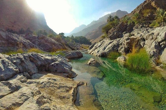 Wadi Al Arbeieen Sinkhole & Fins Beach Swim & Hike - Bimmah Sinkhole Pass-By Stop: Photos First, Then a Short Splash