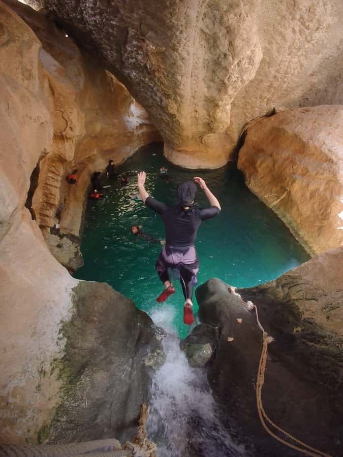 Wadi Shab Parking Meet the Local Guide for Self drivers - The canyon hike to the waterfall cave area